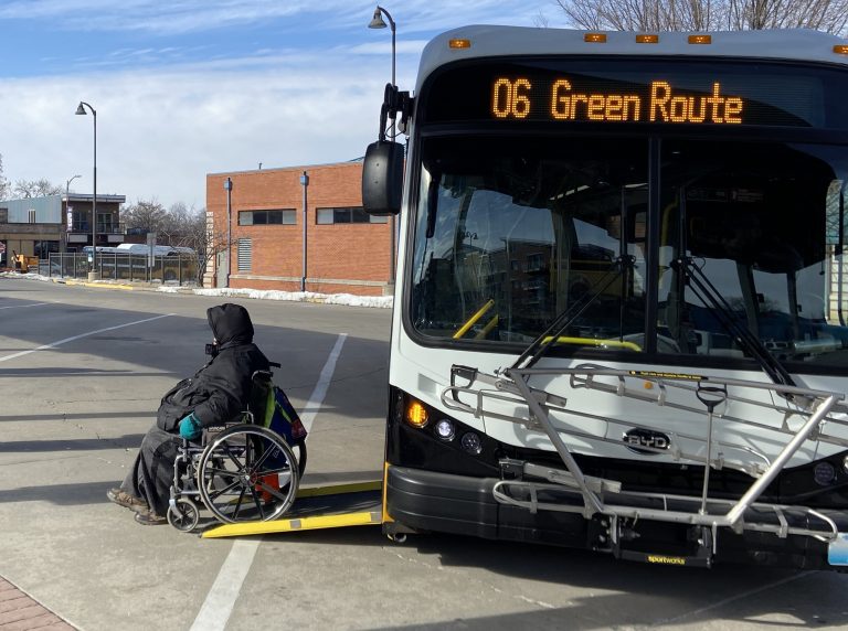 a rider in a wheelchair exits the green route bus at wabash bus station jan. 22 2025 (002)
