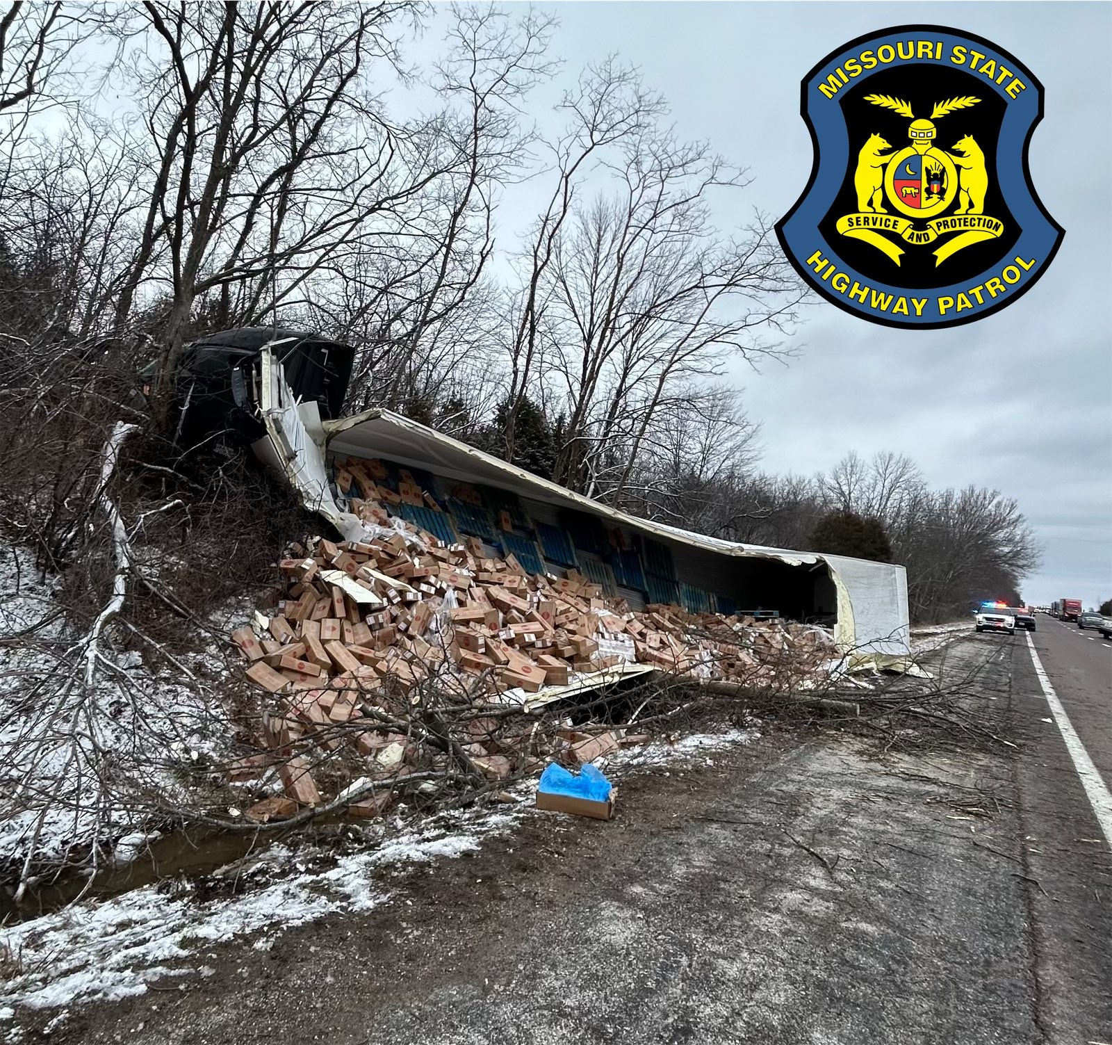 Tractor trailer overturns on I-70 west of Columbia; driver suffers ...